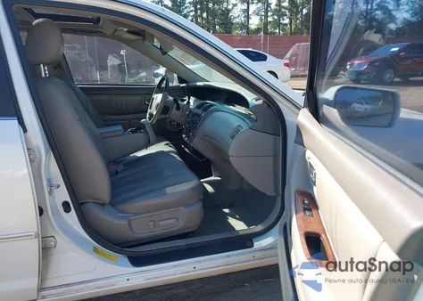 2003 Toyota Avalon Xls z USA, uszkodzony, nr VIN 4T1BF28B43U337143